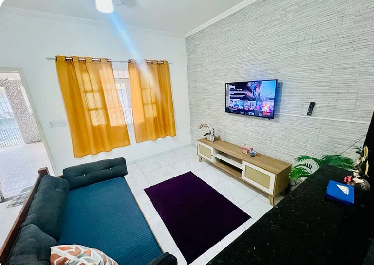 Perto da praia, churrasqueira e 3 vagas de garagem