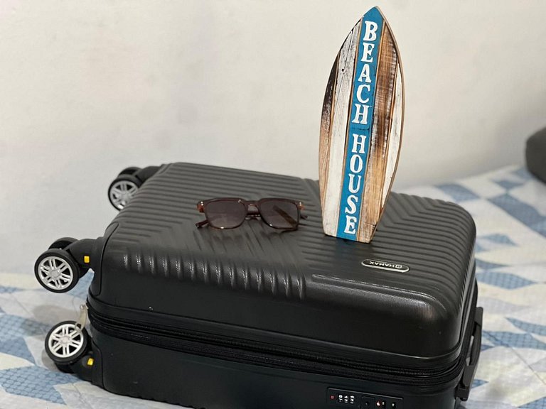 Perto da praia, churrasqueira e 3 vagas de garagem