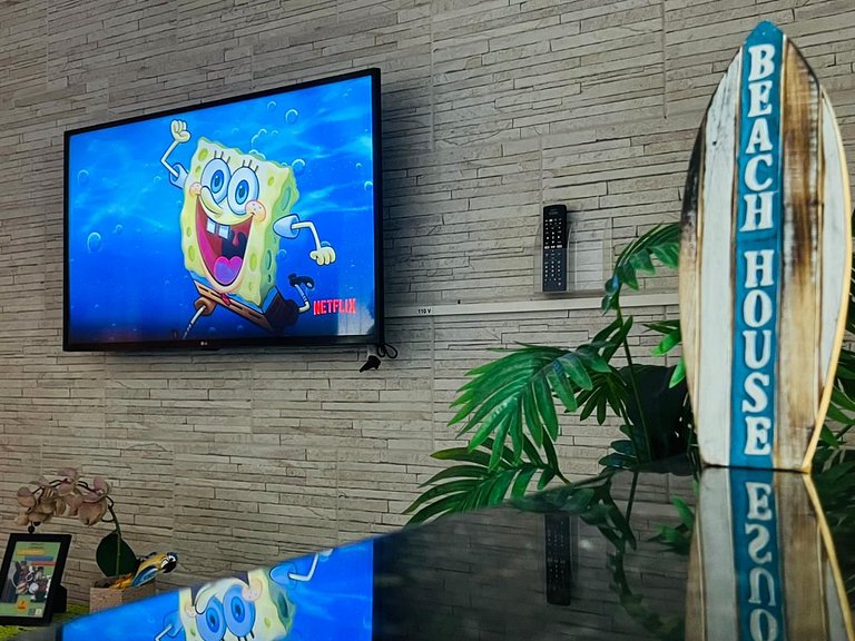 Perto da praia, churrasqueira e 3 vagas de garagem