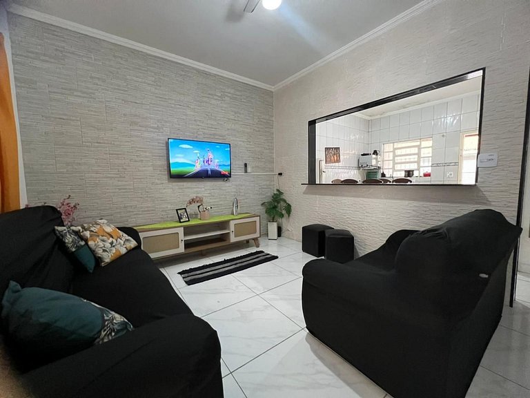 Perto da praia, churrasqueira e 3 vagas de garagem