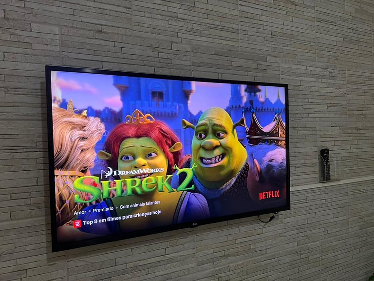 Perto da praia, churrasqueira e 3 vagas de garagem