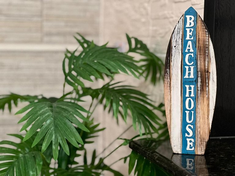 Perto da praia, churrasqueira e 3 vagas de garagem